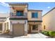 Charming two-story home featuring a balcony, covered entry, and attached garage at 9613 Eland Ct, Las Vegas, NV 89149