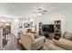 Inviting living room with an open floor plan, with a view into the kitchen and dining area at 9613 Eland Ct, Las Vegas, NV 89149