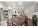 Open floor plan showing the dining and kitchen area with white cabinets and countertops at 9613 Eland Ct, Las Vegas, NV 89149