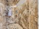 Luxurious shower featuring granite tile walls, multiple shower heads, and upscale fixtures at 9718 Camino Capistrano Ln, Las Vegas, NV 89147