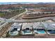 Community aerial view showing modern homes with desert landscaping and mountain backdrop at 104 Tre Pietre St, Henderson, NV 89011