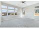 Spacious bedroom with large windows offering ample natural light and scenic views at 104 Tre Pietre St, Henderson, NV 89011