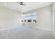 Spacious bedroom with large windows offering ample natural light and scenic views at 104 Tre Pietre St, Henderson, NV 89011