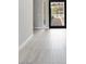 Bright entryway featuring tile flooring and a stylish front door with sidelight windows at 104 Tre Pietre St, Henderson, NV 89011