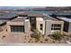 Beautiful modern home featuring a neutral color palette, stone accents, and a spacious two-car garage at 104 Tre Pietre St, Henderson, NV 89011