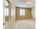 Carpeted bedroom with neutral paint, base trim, and plantation shutters at 11478 Bargetto Ct, Las Vegas, NV 89141