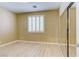 This bedroom features shuttered windows and sliding closet doors with sleek and clean finishes at 11478 Bargetto Ct, Las Vegas, NV 89141