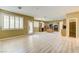 Living space features wood floors, modern kitchen, fireplace, and natural light at 11478 Bargetto Ct, Las Vegas, NV 89141
