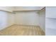 Spacious walk-in closet with carpeted floor, wooden clothes racks and shelves at 11478 Bargetto Ct, Las Vegas, NV 89141