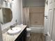 Bathroom features modern vanity with vessel sink, and shower-tub combo at 1396 Couperin Dr, Henderson, NV 89052
