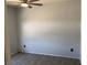This bedroom features neutral paint, modern floors, and is brightly lit by a ceiling fan at 1396 Couperin Dr, Henderson, NV 89052