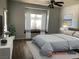 Bedroom with a ceiling fan and window bench for additional seating at 1396 Couperin Dr, Henderson, NV 89052