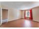 Bright bedroom with tile floors, window, and neutral walls at 1470 Elizabeth Ave # 1, Las Vegas, NV 89119