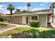Charming one-story home with well-maintained front yard, walkway, and manicured shrubbery at 1470 Elizabeth Ave # 1, Las Vegas, NV 89119