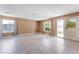 Spacious living room illuminated by natural light, neutral paint, and tile floors at 1470 Elizabeth Ave # 1, Las Vegas, NV 89119