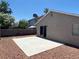 Backyard features a patio and desert landscaping, offering a private and low-maintenance outdoor space at 1501 Wintergreen Dr, Las Vegas, NV 89128