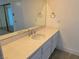 A bright bathroom with a modern vanity and a large mirror at 1501 Wintergreen Dr, Las Vegas, NV 89128