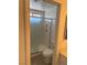 Clean bathroom featuring a tile shower with glass door and white toilet at 1501 Wintergreen Dr, Las Vegas, NV 89128