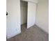 A closet with sliding doors and a rod for hanging clothes at 1501 Wintergreen Dr, Las Vegas, NV 89128