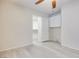 Neutral bedroom with ceiling fan, closet, storage, and plank flooring at 1551 Echo Falls Ave, Las Vegas, NV 89183