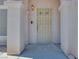 Inviting entryway with a secure screen door and a neutral color scheme at 1551 Echo Falls Ave, Las Vegas, NV 89183