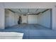 Clean garage featuring built-in storage cabinets, offering organized parking and extra storage space at 1551 Echo Falls Ave, Las Vegas, NV 89183