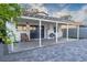 Back patio with covering, chair, and paving stones, offering an outdoor living space at 1728 S Christy Ln, Las Vegas, NV 89142