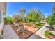 Enjoy relaxing on the backyard patio with multiple seating options at 2045 S Tenaya Way, Las Vegas, NV 89117