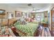 Cozy bedroom with hardwood floors, a ceiling fan, and a comfortable double bed at 2045 S Tenaya Way, Las Vegas, NV 89117