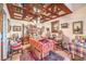 Dining area with a wood ceiling featuring a ceiling mirror detail and vintage décor at 2045 S Tenaya Way, Las Vegas, NV 89117