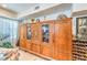 Elegant built-in cabinet and wine rack add sophistication to this cozy living space at 2045 S Tenaya Way, Las Vegas, NV 89117