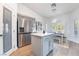 Bright kitchen featuring stainless steel appliances, a pantry, and a breakfast nook with natural light at 2144 Paganini Ave, Henderson, NV 89052