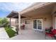 Relax on the covered patio, perfect for entertaining or enjoying the outdoors at 2144 Paganini Ave, Henderson, NV 89052