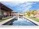 Inviting backyard with pool, patio, and lush landscaping. Perfect for outdoor living at 2144 Paganini Ave, Henderson, NV 89052