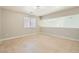 Bright bedroom featuring natural light, with wood-look flooring and neutral walls at 216 Sharp Edge Ave, North Las Vegas, NV 89031