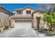 Charming two-story home with a well-maintained front yard and a two-car garage at 216 Sharp Edge Ave, North Las Vegas, NV 89031