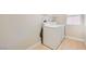 Clean and functional laundry room with side by side washer and dryer at 216 Sharp Edge Ave, North Las Vegas, NV 89031
