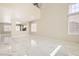 Expansive living room featuring marble floors, high ceilings, and large windows at 216 Sharp Edge Ave, North Las Vegas, NV 89031