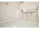 Spacious open-concept living area with marble floors, high ceilings, and stairway access at 216 Sharp Edge Ave, North Las Vegas, NV 89031