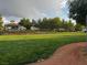 Peaceful community park with walking path, gazebo, and well-maintained lawn at 2419 Pebble Springs Ct, Henderson, NV 89074