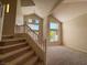Bright living room featuring high ceilings and many windows for natural light at 2419 Pebble Springs Ct, Henderson, NV 89074