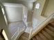 Carpeted staircase and railing leading to the second floor of the house at 2419 Pebble Springs Ct, Henderson, NV 89074