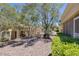 A backyard with desert landscaping, including rocks, bushes, and iron fencing around the property at 2420 Desert Butte Dr, Las Vegas, NV 89134
