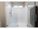 Modern shower with glass enclosure, sleek fixtures, and a handheld showerhead at 2420 Desert Butte Dr, Las Vegas, NV 89134