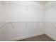 Walk-in closet featuring ample shelving for organized storage at 2420 Desert Butte Dr, Las Vegas, NV 89134
