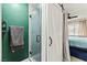 Bathroom featuring a glass shower enclosure, modern fixtures, and a sliding barn door at 2569 Paradise Village Way, Las Vegas, NV 89120
