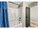 Clean bathroom offers a new shower and tub, complete with contemporary black fixtures and neutral tones at 2569 Paradise Village Way, Las Vegas, NV 89120