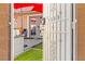 Well-maintained carport with designated parking spaces, car, and convenient access to building's entry door at 2569 Paradise Village Way, Las Vegas, NV 89120