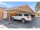 Covered carport with parking area providing protection and convenience for residents and their vehicles at 2569 Paradise Village Way, Las Vegas, NV 89120
