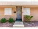 Inviting home front entrance with security door and desert landscaping at 2569 Paradise Village Way, Las Vegas, NV 89120